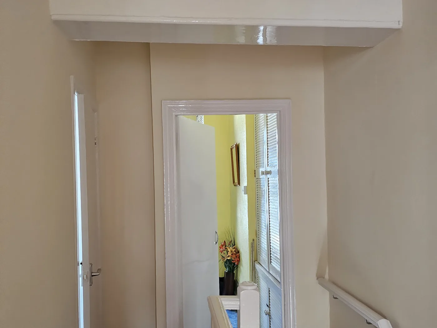 Landing decorated, clean lines between wall and woodwork
