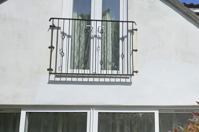 The same wall re-rendered and painted, with no sign of the repair