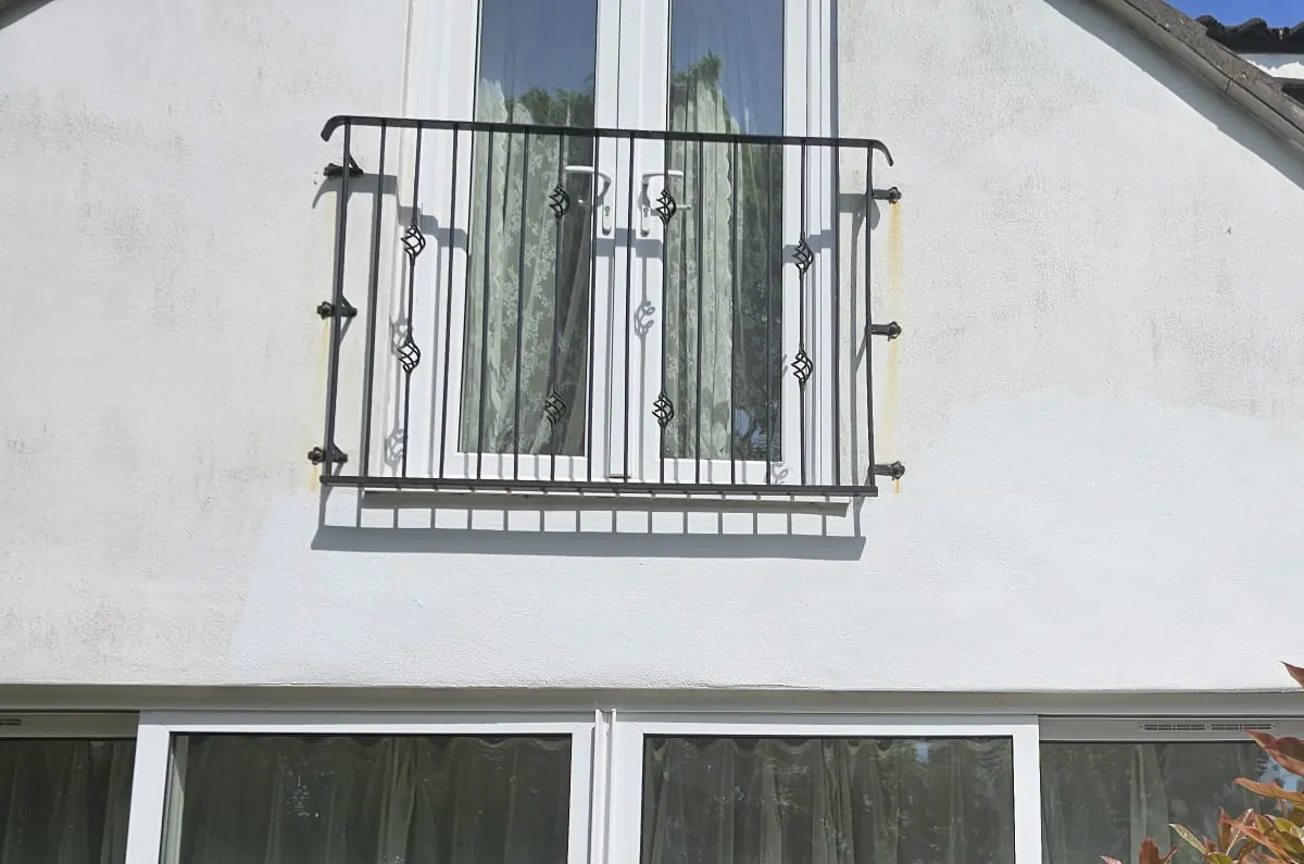 The same wall re-rendered and painted, with no sign of the repair